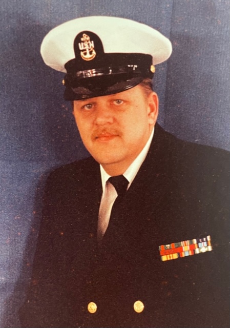 Charles E. “Gene” Young