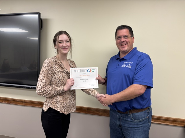 Chloe Veatch - Elliott named Salesperson of the Year Pictured with Jeremy Jordan photo courtesy of Tracy Orr