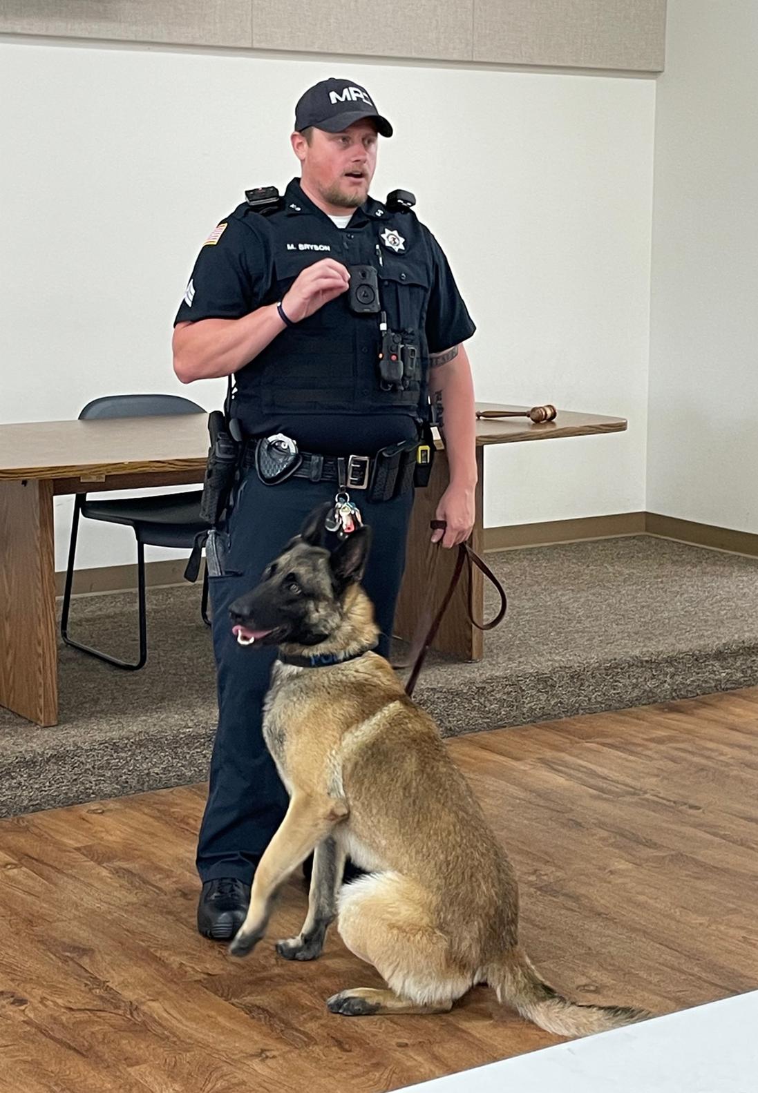 Officer Mat Bryson with K-9 Polo