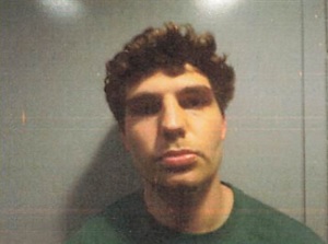 Mugshot of Alex Riddle.